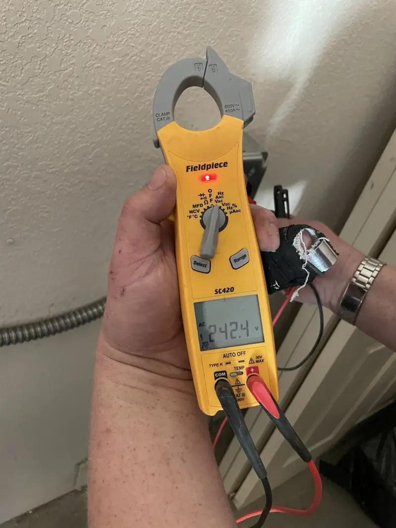 Voltage testing with clamp meter during Electrical Installation Services in McMinnville